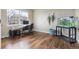 Bright home office with hardwood floors, a large window, and an aquarium at 3475 Golden Spur Loop, Castle Rock, CO 80108