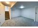 Unfinished basement area with carpeted floor at 3802 Desert Willow Ave, Broomfield, CO 80020