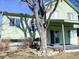 Green house exterior with backyard view at 3802 Desert Willow Ave, Broomfield, CO 80020