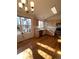 Bright kitchen with light wood cabinets, hardwood floors, and a chandelier at 3802 Desert Willow Ave, Broomfield, CO 80020