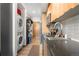 Well-equipped kitchen with modern appliances, laundry, and plenty of storage at 603 Inca St # 530, Denver, CO 80204