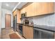 Modern kitchen with stainless steel appliances, ample counter space, and stylish cabinetry at 603 Inca St # 530, Denver, CO 80204
