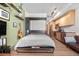 Open-concept living space with a Murphy bed, sleek cabinets, and a well-equipped kitchen at 603 Inca St # 530, Denver, CO 80204