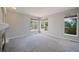 Bright living room with large windows and a fireplace, offering a comfortable space at 17235 Opal Hill Dr, Parker, CO 80134