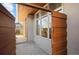 Inviting entrance featuring modern design elements and a wooden gate at 3930 Yates St, Denver, CO 80212