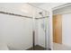 Shower stall with glass door and white subway tile at 3930 Yates St, Denver, CO 80212