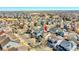 Aerial view of the property in a neighborhood with mountain views at 10622 Racine St, Commerce City, CO 80022