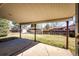 Covered back porch with view of the backyard, providing a perfect spot for outdoor enjoyment at 1302 S Cape Way, Lakewood, CO 80232