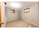 Cozy bedroom with carpet, natural light, and a closet at 1302 S Cape Way, Lakewood, CO 80232