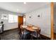 Dining area features a modern table setting and adjacent to the kitchen at 1302 S Cape Way, Lakewood, CO 80232