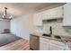 Updated kitchen with stainless steel dishwasher and granite countertops at 3184 S Heather Gardens Way # 302, Aurora, CO 80014