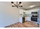 Updated kitchen with stainless steel appliances, granite counters, and sleek cabinetry at 3184 S Heather Gardens Way # 302, Aurora, CO 80014