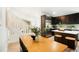 Eat-in kitchen and dining area showcasing stainless appliances and an open layout at 129 Gordon Pl, Castle Rock, CO 80104