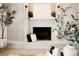 The living room features a painted brick fireplace and decorative items at 129 Gordon Pl, Castle Rock, CO 80104
