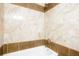 Close up on the tiled shower and fixtures at 129 Gordon Pl, Castle Rock, CO 80104