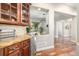 Hallway with wood accents, granite countertops and an open space that lets in natural light at 15501 Fairway Dr, Commerce City, CO 80022