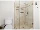 Clean bathroom with a large walk-in shower and neutral tile at 5603 W 118Th Pl, Broomfield, CO 80020