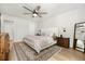 Bright bedroom featuring a comfortable bed and stylish nightstands at 5603 W 118Th Pl, Broomfield, CO 80020