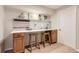 Spacious craft room with custom desk and storage at 9743 Chanteclair Cir, Highlands Ranch, CO 80126
