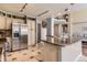 Well-appointed kitchen with stainless appliances, ample counter space, and custom cabinets at 9743 Chanteclair Cir, Highlands Ranch, CO 80126