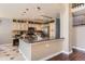 Modern kitchen with granite countertops, stainless steel appliances, and custom cabinetry at 9743 Chanteclair Cir, Highlands Ranch, CO 80126