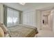 Bedroom featuring a double closet and a doorway into the hall at 21238 Snowshoe Ln, Parker, CO 80138