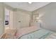 Comfortable bedroom featuring a double bed, large closet space, and neutral-colored walls at 21238 Snowshoe Ln, Parker, CO 80138