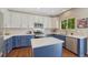 Updated kitchen features white subway tile backsplash and stainless steel appliances at 21238 Snowshoe Ln, Parker, CO 80138