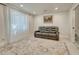 Comfortable living room with cozy seating, a patterned rug, and lots of natural light at 21238 Snowshoe Ln, Parker, CO 80138