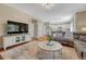 Spacious living room opens to modern eat-in kitchen at 21238 Snowshoe Ln, Parker, CO 80138