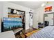 Comfortable bedroom with ample closet space, adjacent storage, and neutral décor at 3623 S Sheridan Blvd # 12, Denver, CO 80235