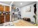 Well-maintained kitchen featuring stainless steel refrigerator and wooden cabinetry at 3623 S Sheridan Blvd # 12, Denver, CO 80235