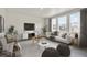 Living room with modern furniture and large windows at 18134 Prince Hill Cir, Parker, CO 80134