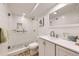 Clean bathroom with a walk-in shower, vanity, updated faucet, and light fixture at 10621 Julian St, Westminster, CO 80031