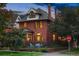 Beautiful brick home with manicured lawn and inviting front porch at 2155 N High St, Denver, CO 80205