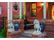 Charming front porch featuring classic lion statues and decorative floral arrangements at 2155 N High St, Denver, CO 80205