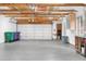 Spacious garage featuring painted walls and exposed beams at 2155 N High St, Denver, CO 80205