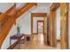 Elegant hallway with hardwood floors and natural wood trim, showcasing classic architecture at 2155 N High St, Denver, CO 80205