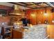 Outdoor kitchen area with a built-in grill, sleek countertops, and cozy seating at 2155 N High St, Denver, CO 80205