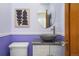 Stylish powder room with a vessel sink and modern fixtures at 2155 N High St, Denver, CO 80205