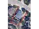 An aerial view of the property and neighborhood with mature landscaping and a well-maintained yard at 5830 Jasper Pointe Cir, Castle Pines, CO 80108
