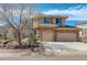 Charming home featuring a stone and stucco facade, a well-manicured lawn, and a convenient three-car garage at 5830 Jasper Pointe Cir, Castle Pines, CO 80108