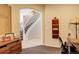 Hallway with stairs leading to the upper level at 5830 Jasper Pointe Cir, Castle Pines, CO 80108