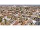 Scenic aerial view displays a tree-filled neighborhood with a distant city skyline backdrop at 618 Adams St, Denver, CO 80206