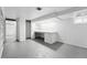 Basement with built-in desk and shelving, closet, and window allowing for natural light at 618 Adams St, Denver, CO 80206