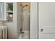Bathroom featuring a shower over tub and built-in shelves at 618 Adams St, Denver, CO 80206