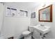 Bathroom features white toilet, sink, and bath at 618 Adams St, Denver, CO 80206