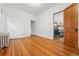 Bedroom with hardwood floors and a doorway to another room at 618 Adams St, Denver, CO 80206