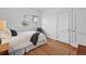 Bedroom with natural light, hardwood floors, and neutral decor at 618 Adams St, Denver, CO 80206