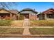 Attractive single-Gathering home with a red brick facade, tidy front yard, and welcoming entrance at 618 Adams St, Denver, CO 80206
